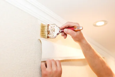 Pose de papier peint à Pierres — revêtements muraux et toiles de verre